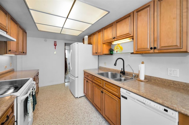 kitchen with exhaust hood, white appliances, and sink