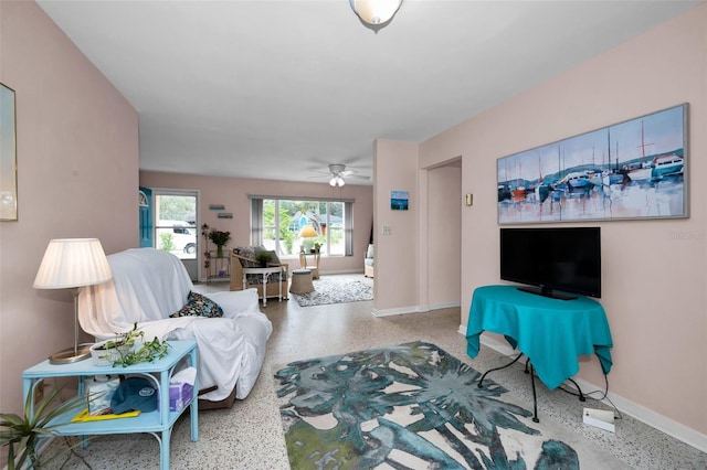 living room featuring ceiling fan