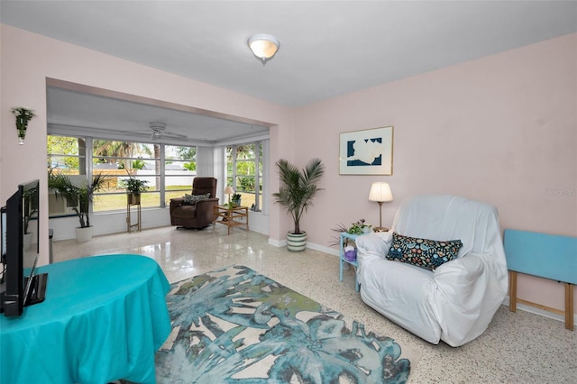 living room featuring ceiling fan