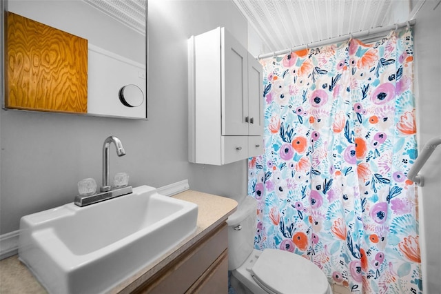 bathroom with toilet, a shower with shower curtain, and vanity