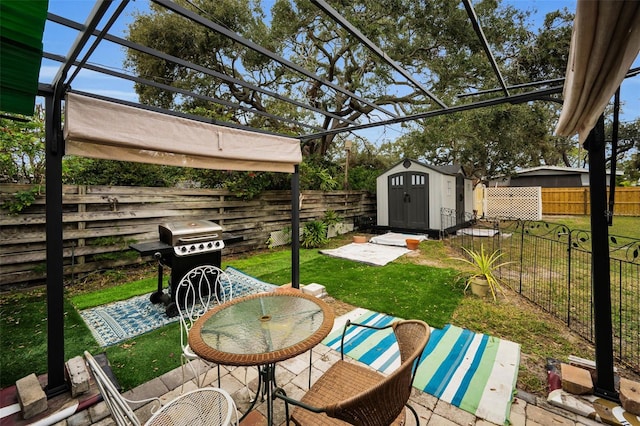 exterior space featuring a grill, a storage unit, and a pergola