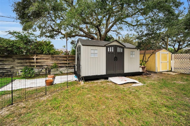 view of outbuilding with a lawn