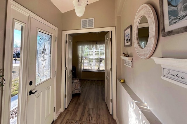 doorway featuring dark hardwood / wood-style flooring