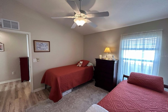 bedroom with light wood-type flooring and ceiling fan