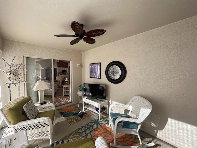 living room featuring ceiling fan