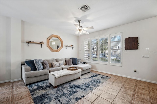 living room with ceiling fan