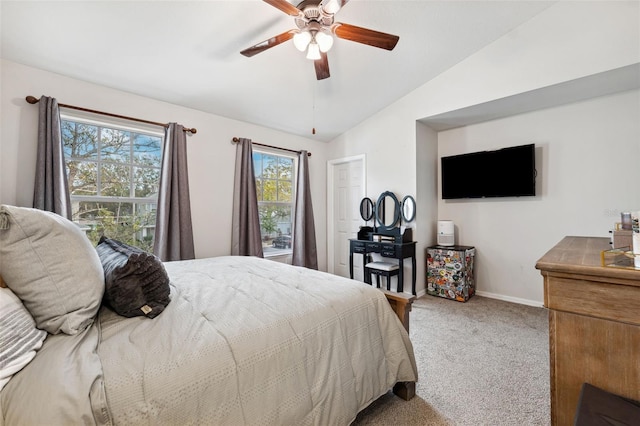 carpeted bedroom featuring ceiling fan and lofted ceiling