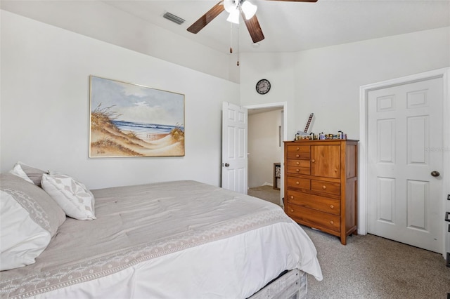 carpeted bedroom featuring ceiling fan and lofted ceiling