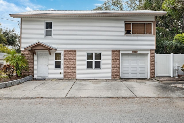 front of property with a garage