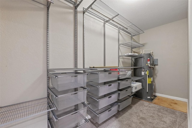 storage area featuring hybrid water heater