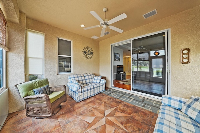 view of patio / terrace featuring ceiling fan