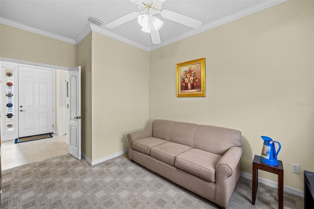 living room featuring ceiling fan and ornamental molding