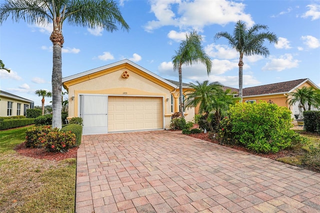 single story home featuring a garage