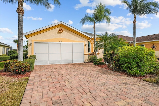 single story home featuring a garage