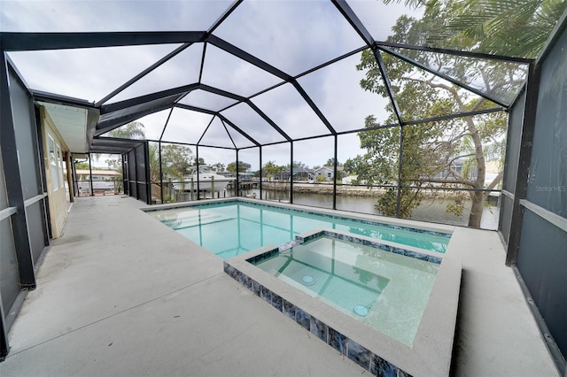 view of swimming pool with an in ground hot tub, a lanai, a water view, and a patio area