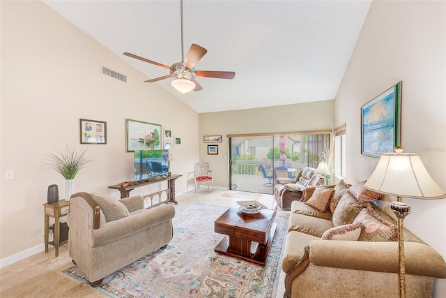 living room with high vaulted ceiling and ceiling fan