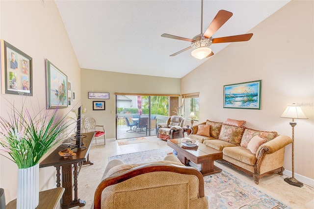 living room featuring ceiling fan and high vaulted ceiling