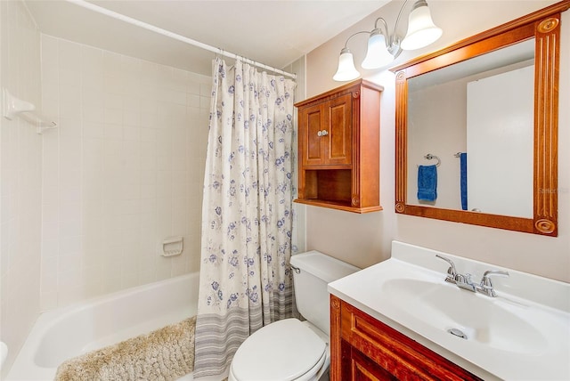 full bathroom featuring vanity, shower / bath combination with curtain, and toilet