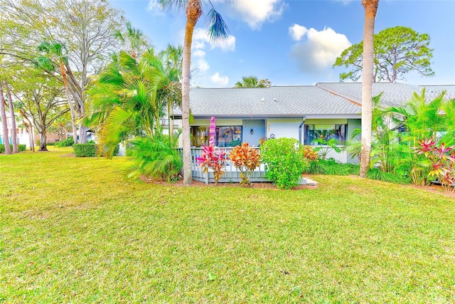 view of front of house with a front lawn