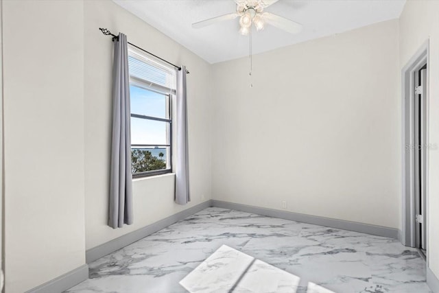 unfurnished room featuring ceiling fan