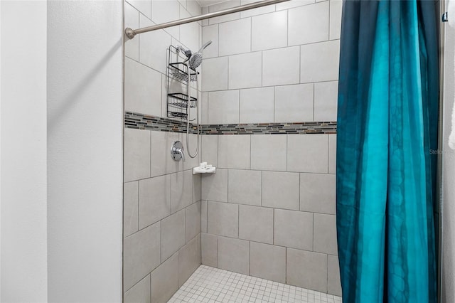 bathroom with a shower with shower curtain