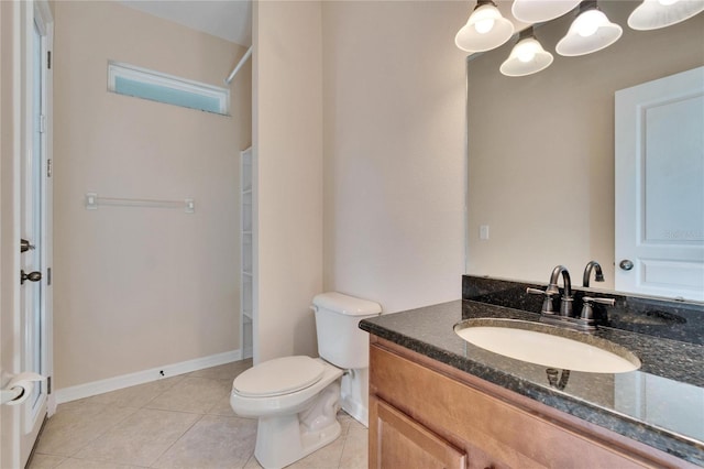 bathroom with vanity, a shower, tile patterned floors, toilet, and a chandelier