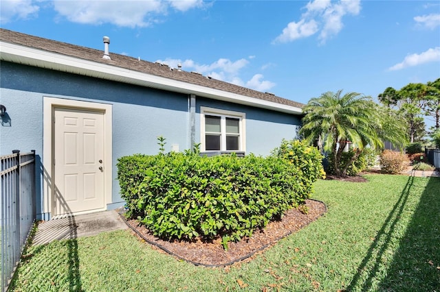 exterior space featuring a lawn