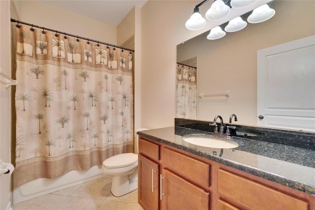 full bathroom featuring tile patterned flooring, vanity, toilet, and shower / bath combo with shower curtain