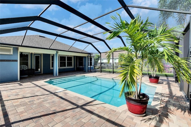 view of pool featuring a patio and a lanai