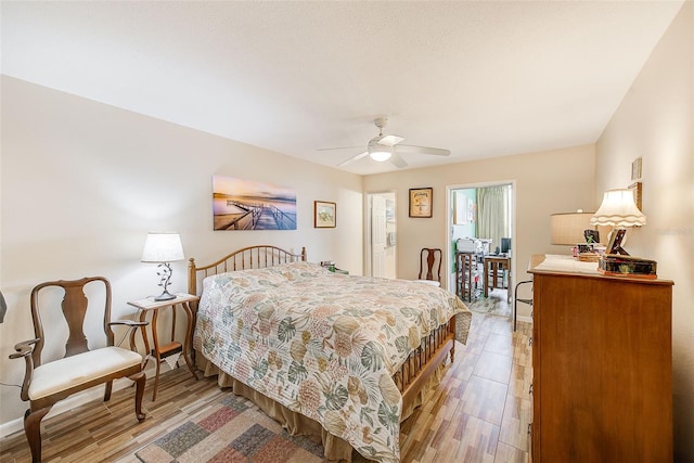 bedroom featuring ceiling fan and light hardwood / wood-style floors