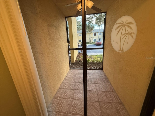 entryway with ceiling fan