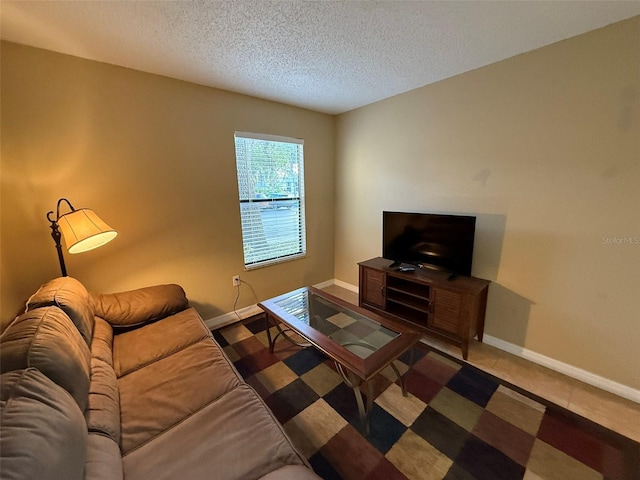 living room with a textured ceiling