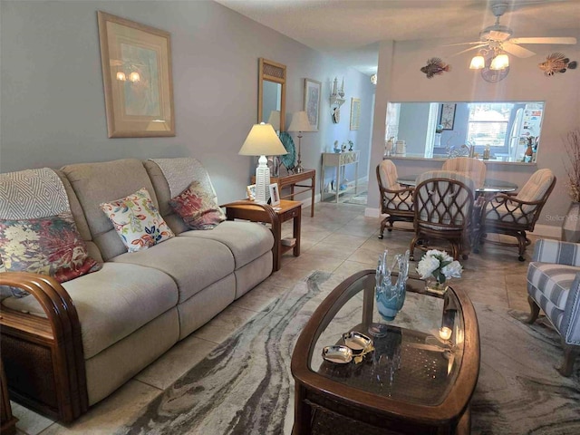 tiled living room featuring ceiling fan