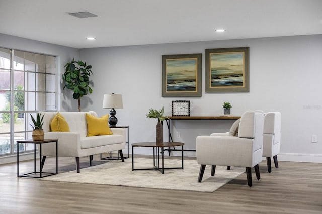 sitting room with light hardwood / wood-style floors