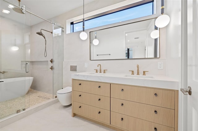 bathroom with tile walls, toilet, a shower with door, and vanity