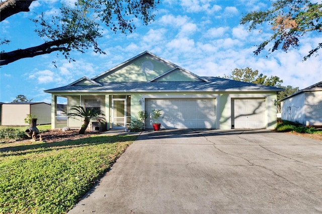 ranch-style house featuring a garage