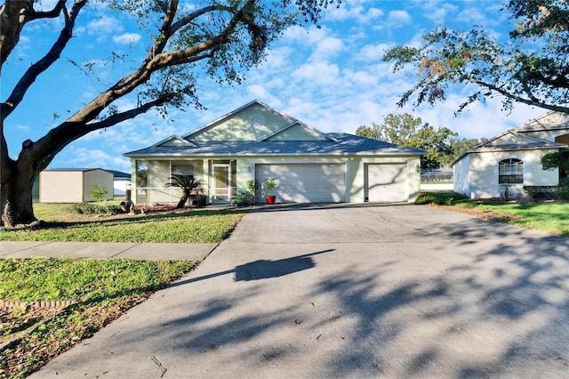 single story home with a garage