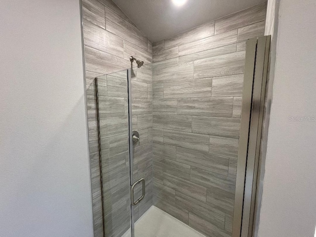 bathroom featuring walk in shower