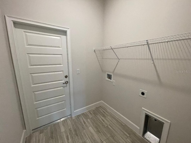 clothes washing area featuring washer hookup and hookup for an electric dryer