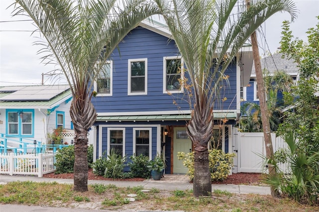 view of front of house with solar panels