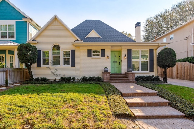 view of front of home with a front lawn