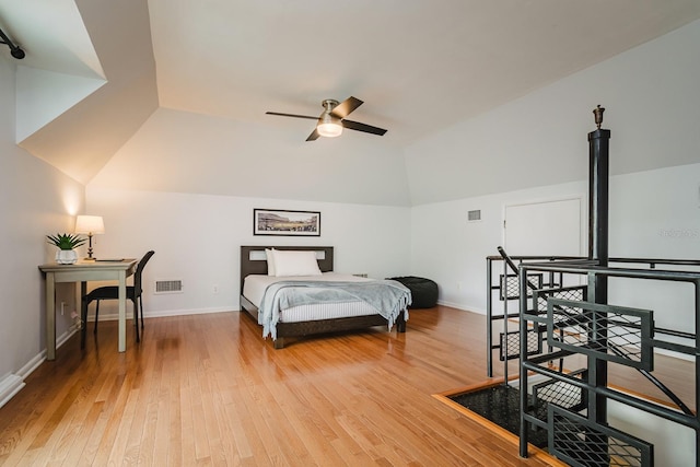 bedroom with lofted ceiling, light hardwood / wood-style floors, and ceiling fan