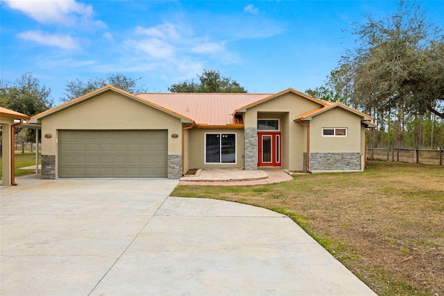 ranch-style home with a garage and a front lawn