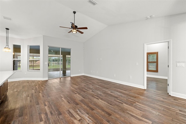 unfurnished living room with lofted ceiling, dark wood-type flooring, and ceiling fan