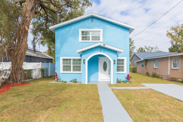 view of front facade with a front lawn