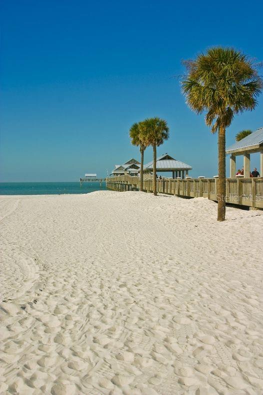 property view of water featuring a beach view