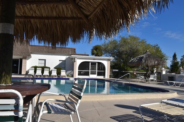 view of pool featuring a patio area