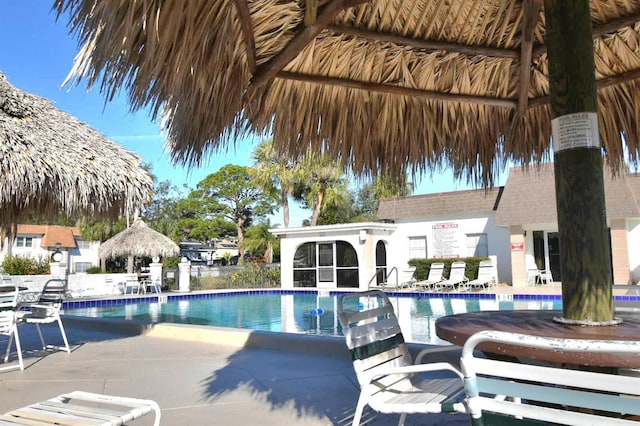 view of pool with a gazebo and a patio