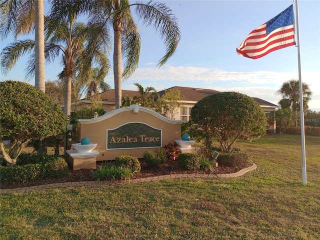 community sign with a lawn