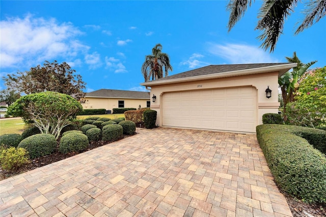 single story home with a garage